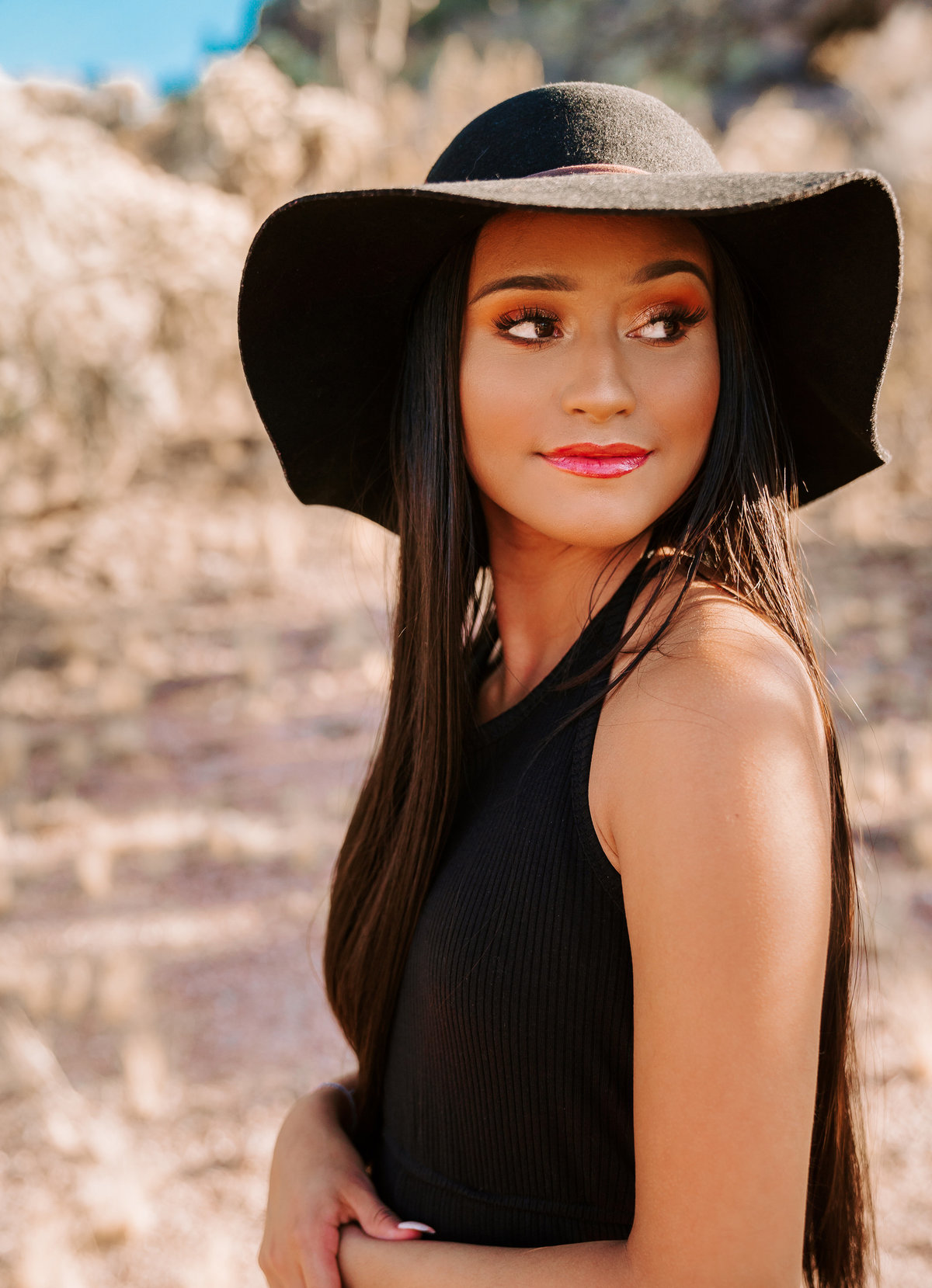 high school senior girl wearing black hat and romper kalamazoo MI