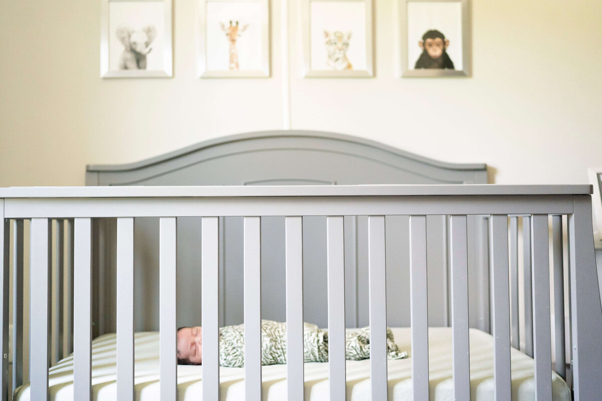 Baby laying in crib