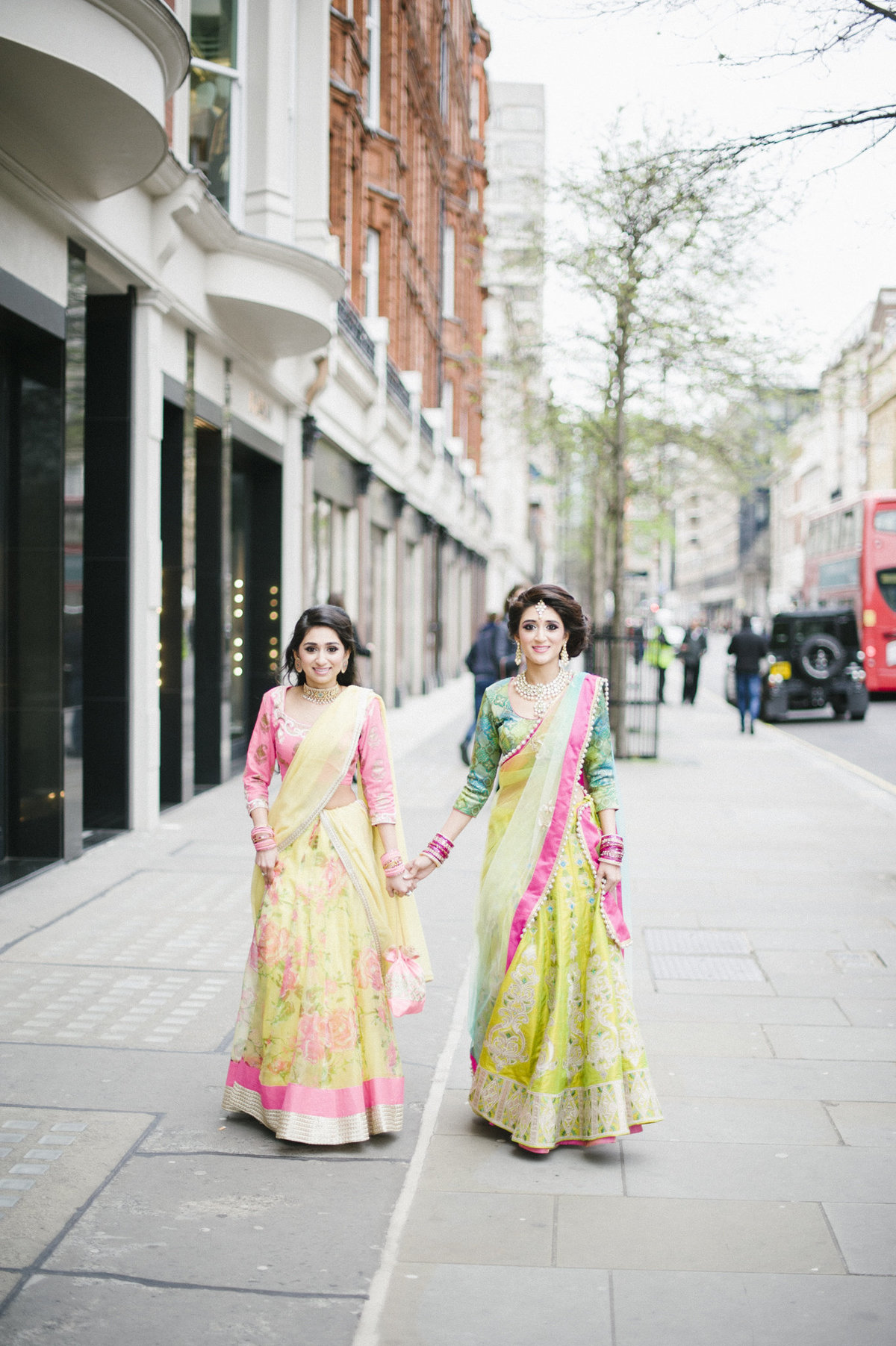 bride and her sister walking london mayfair