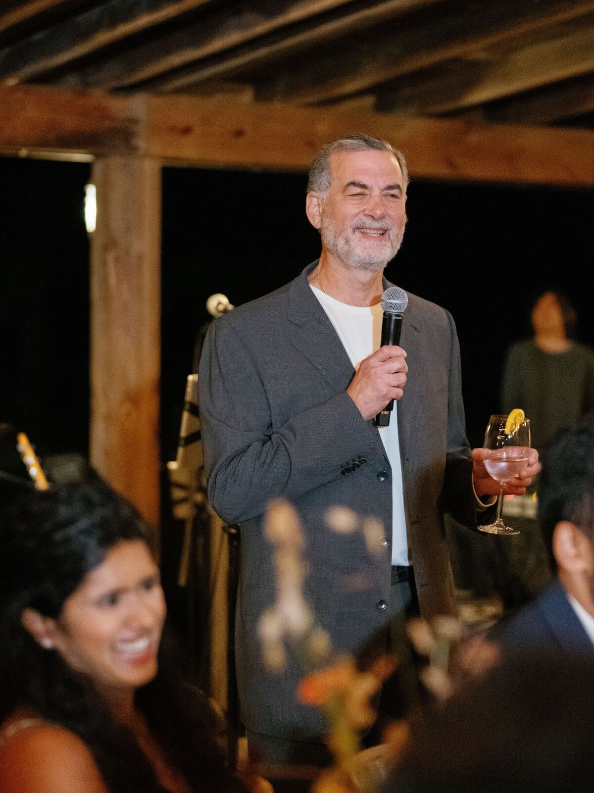 Man Making Speech at Welcome Party