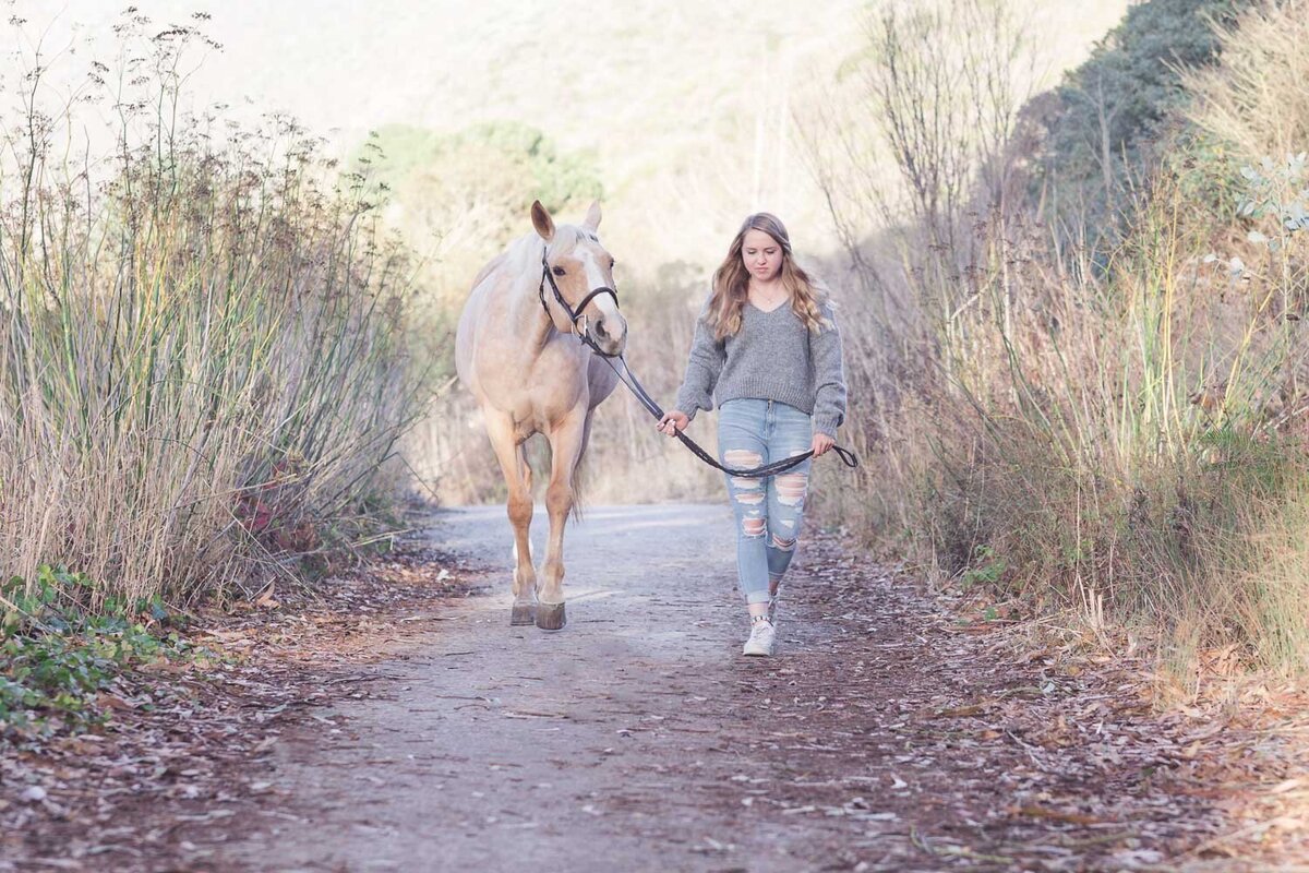 teenager with her horse