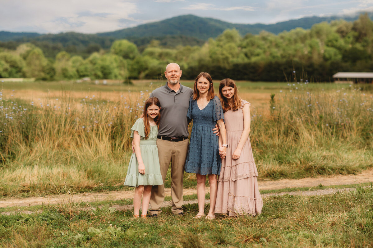 Family poses for Family Photos during an Extended Family Portrait Session in Asheville, NC.