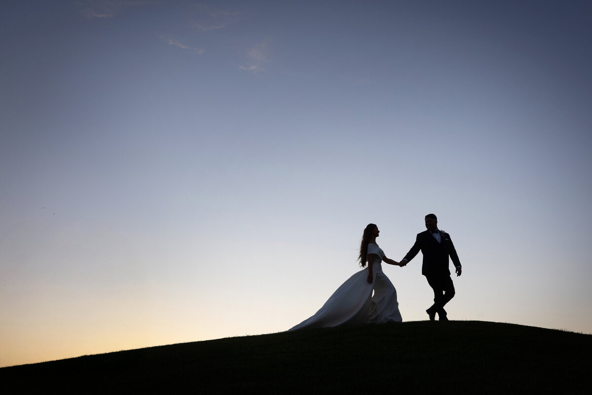 bride-groom-walking-sihlouette-sunset-NJ-07746
