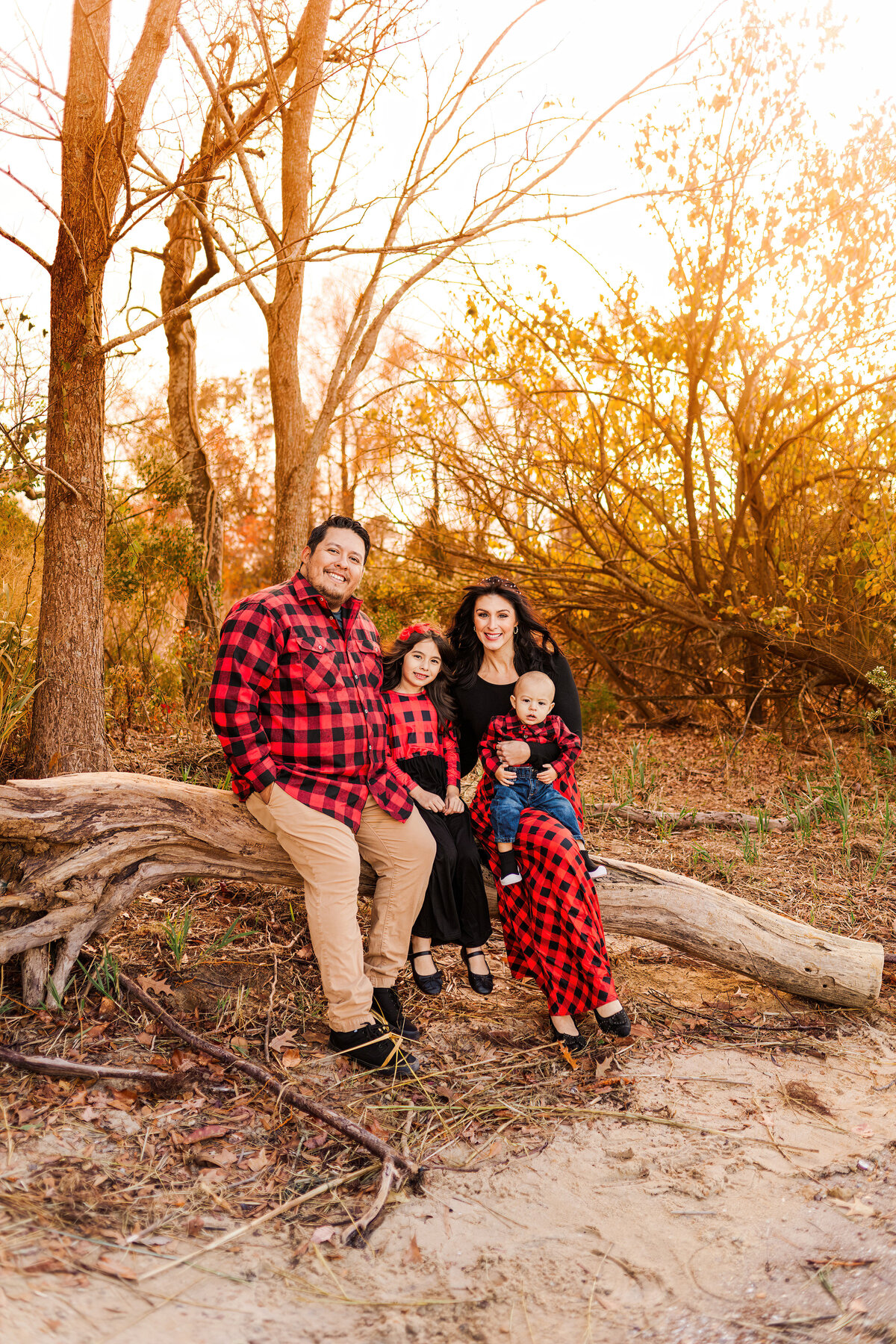 Family standing near Suffolk Riverfront at Sleepy Hole Park for Family Photo Session at Sunset in Fall - Rebekah Heffington Photography