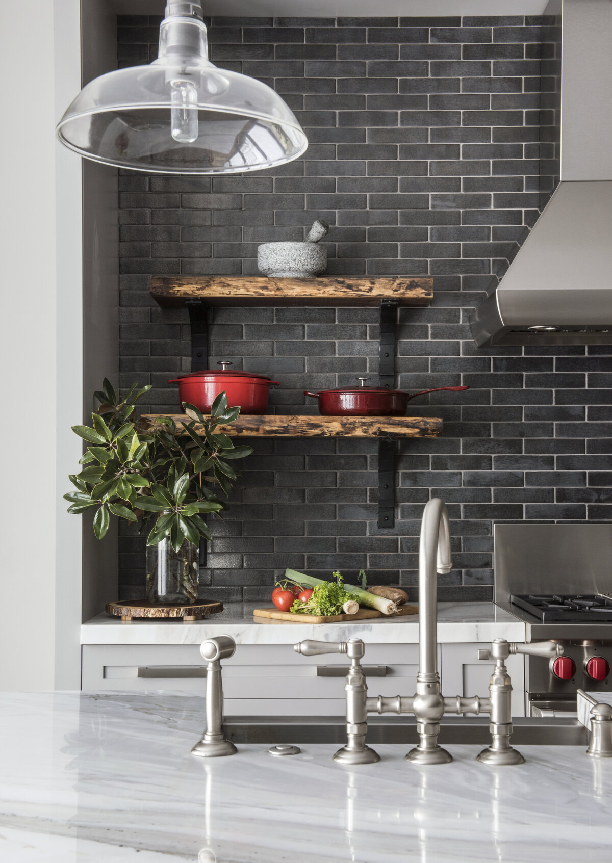 Classic Design kitchen faucet with brick wall tiles and wall shelves