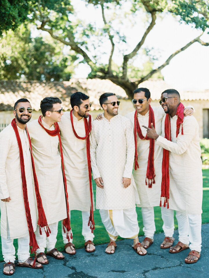 indian wedding men wearing white kurtas
