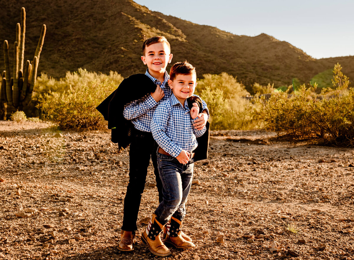 brothers posing for family photography in AZ by Amber