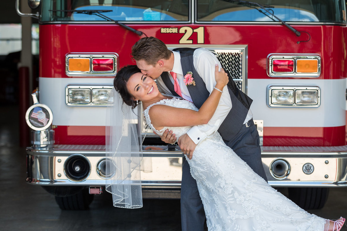Wedding Photography - Blake, being a volunteer fireman, wanted to incorporate his fire house and they were just the sweetest couple in the world here to get incredible shots!