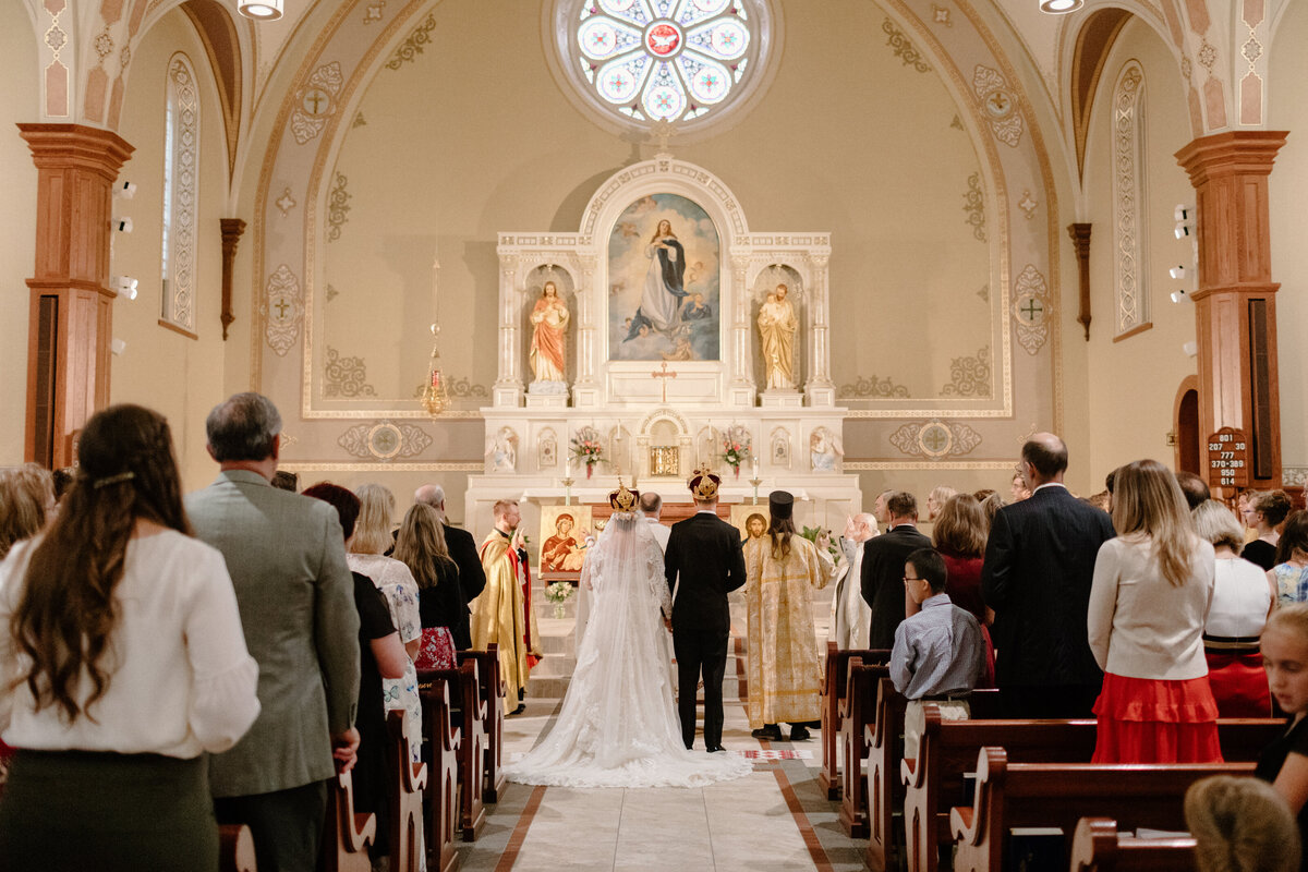 people attending a Catholic wedding
