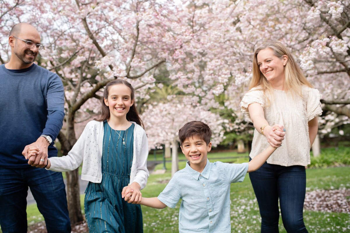 Family session located at the cherry blossom fields