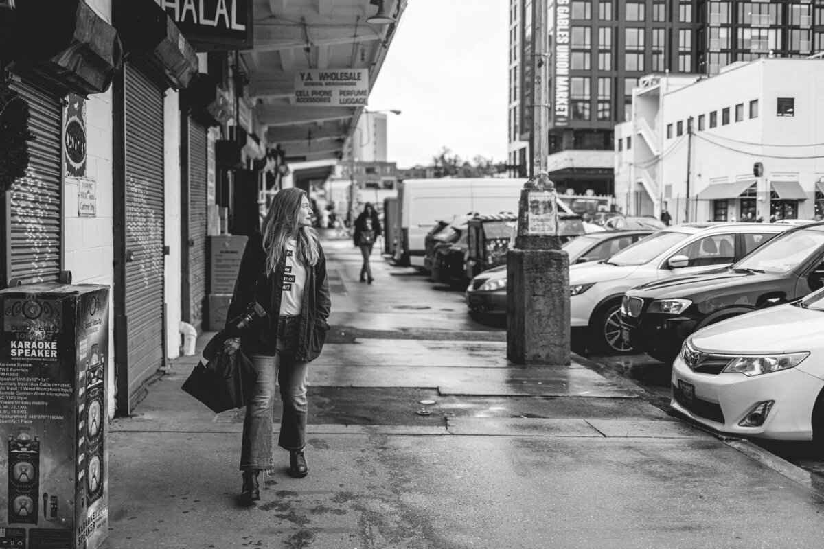 Woman walking down the street in Union Market District