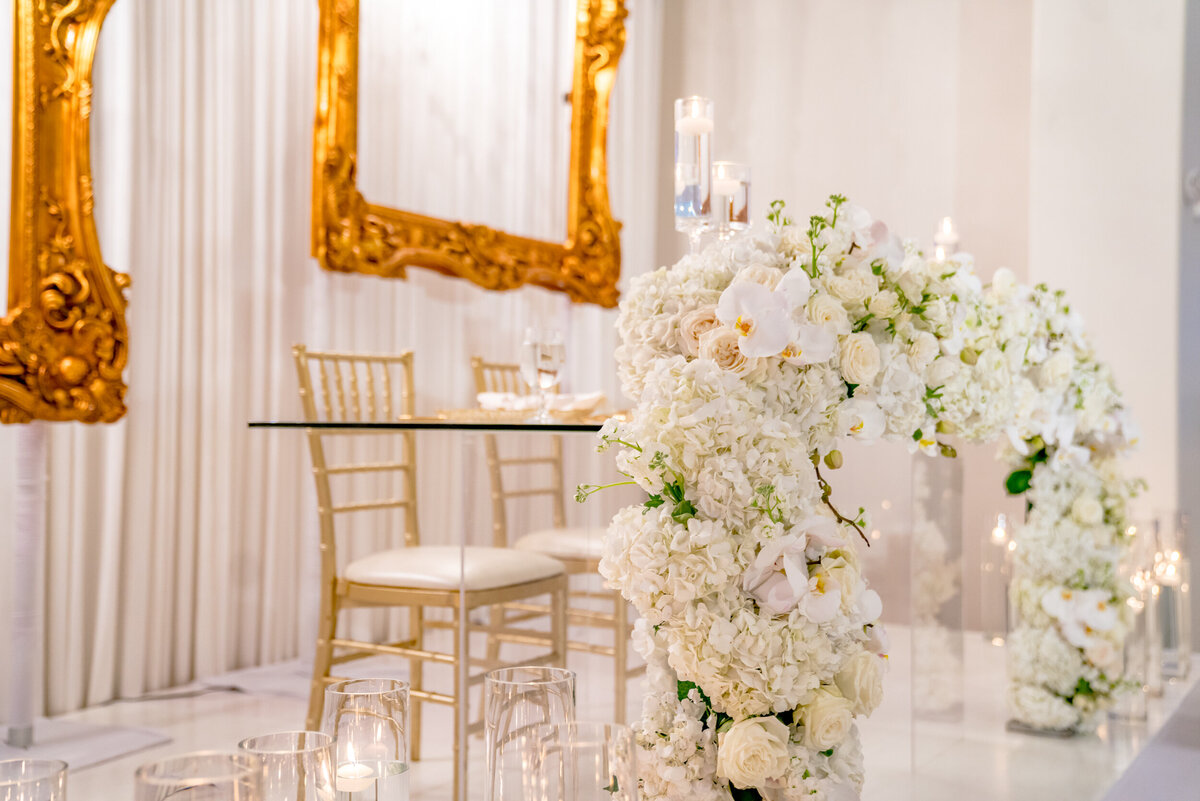 reception venue head-table-gold-floral-drape