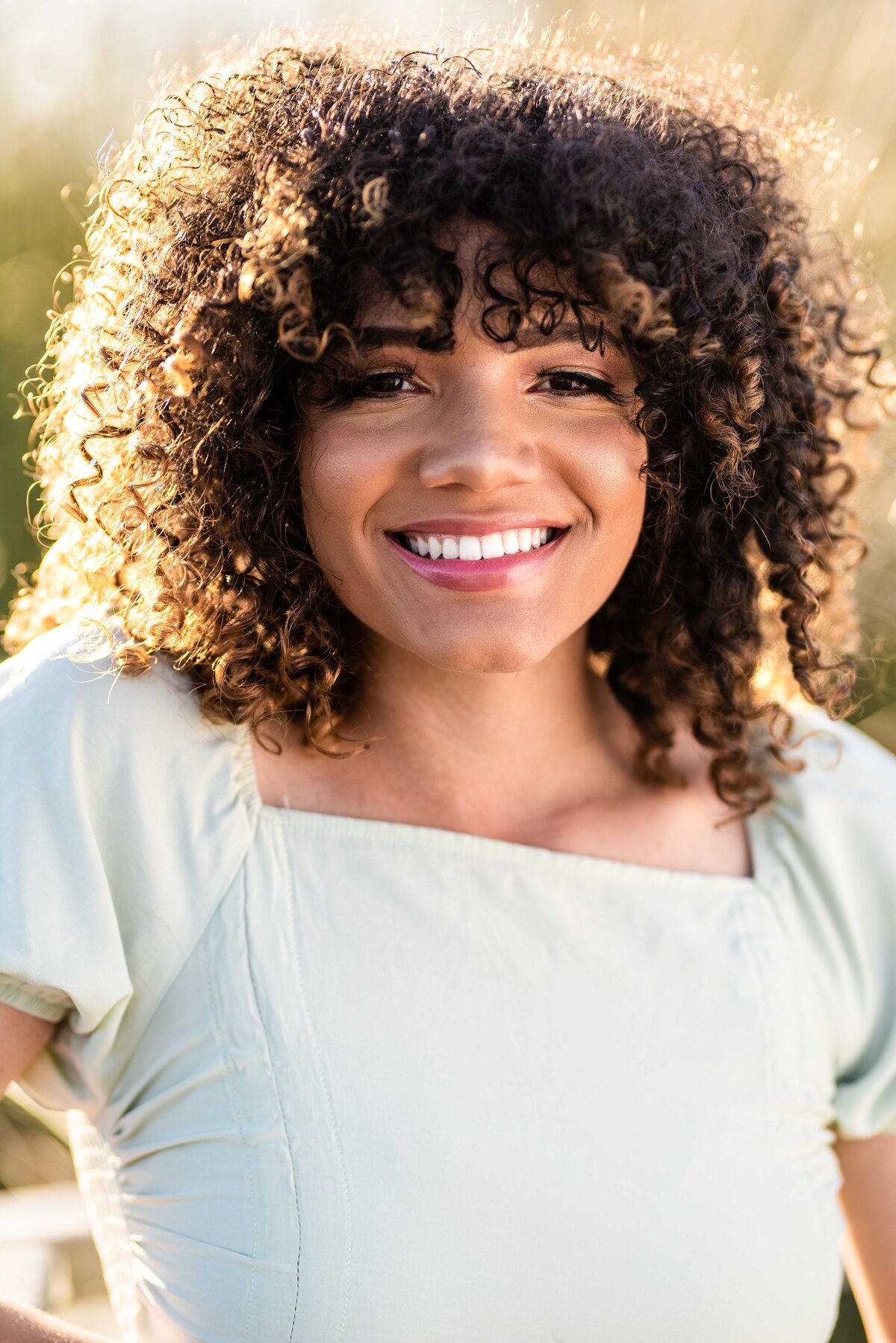 African American Girl with curly hair and smile