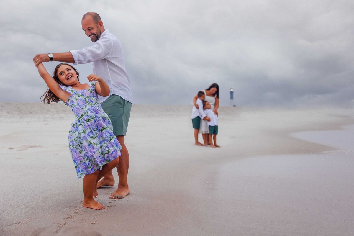 dad twirling daughter long island family photographer