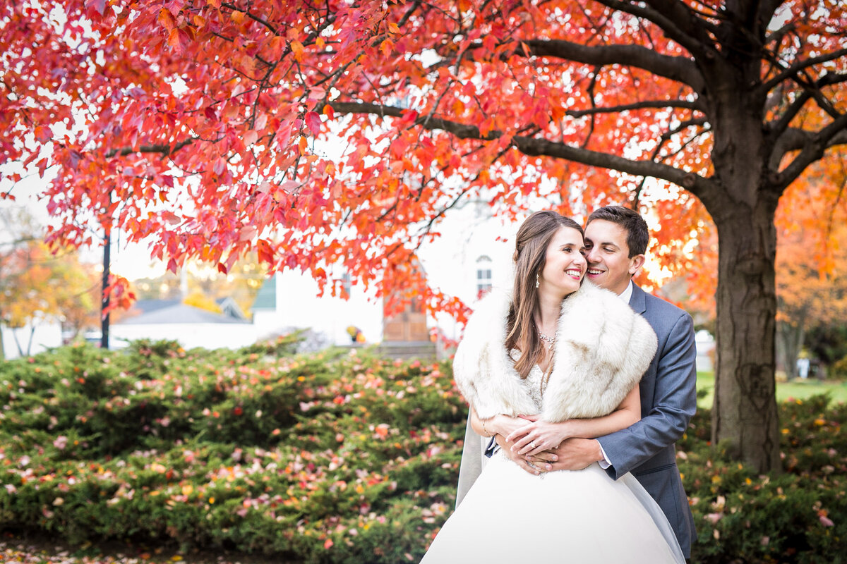 njeri-bishota-lauren-ashley-fall-foliage-wedding-bride-fur-groom-church-photography