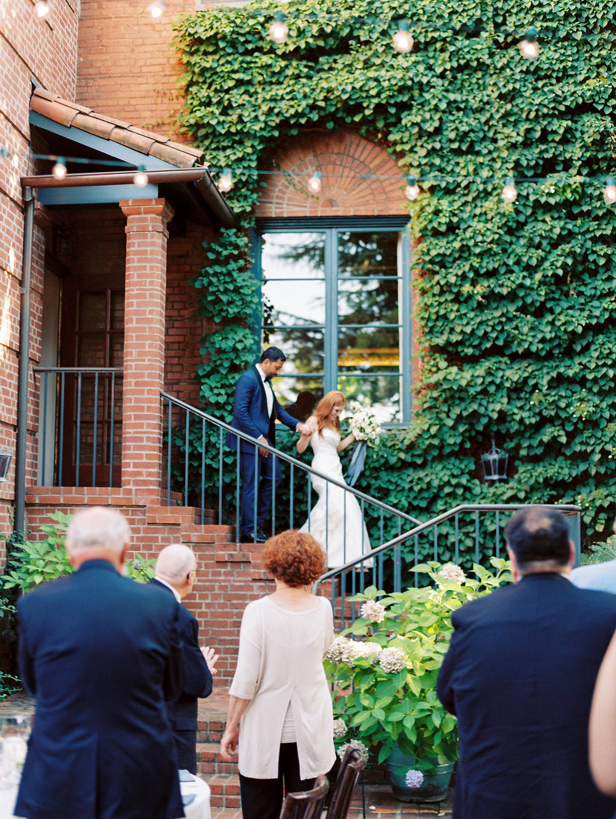 bride and groom's grand entrance at the town club in portland