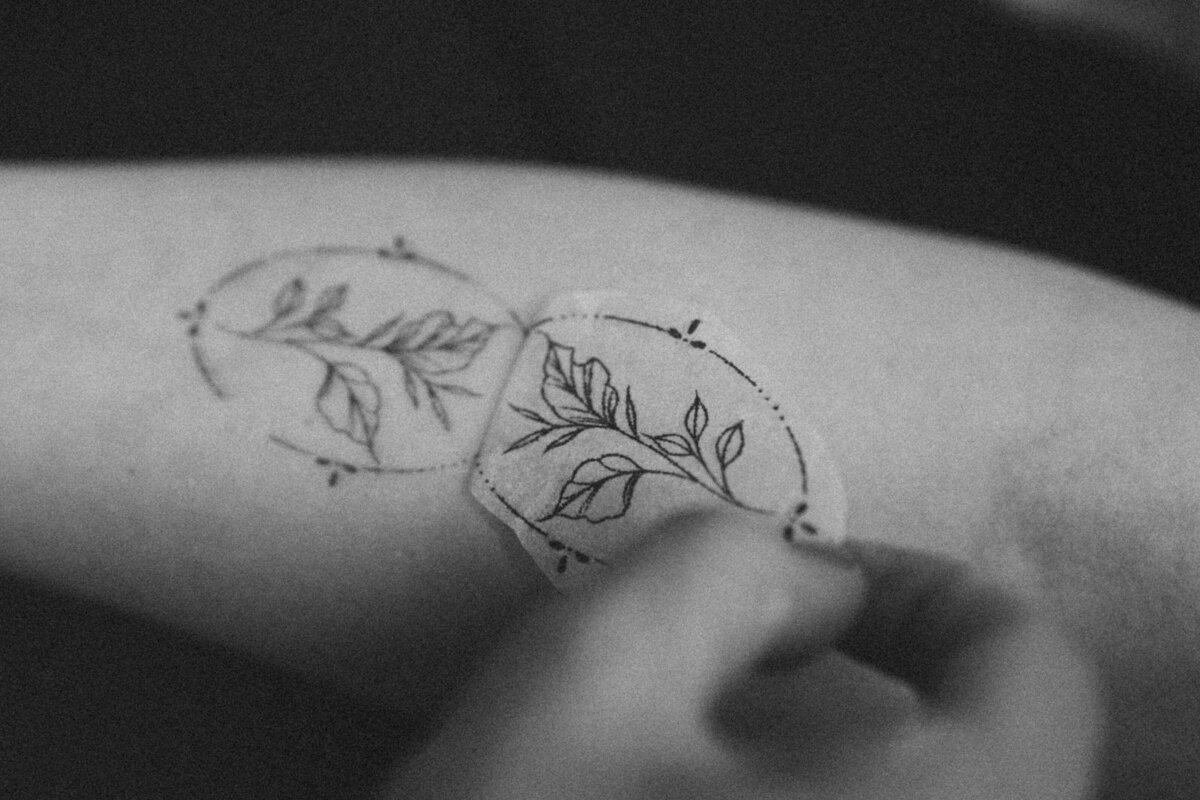 Elegant black ink tattoo created with ultra-fine lines by a professional Pittsburgh tattoo artist.