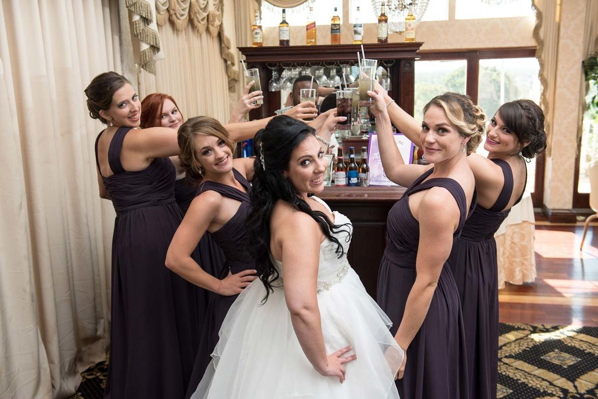 Bridesmaids doing a shot at Giorgio's Catering
