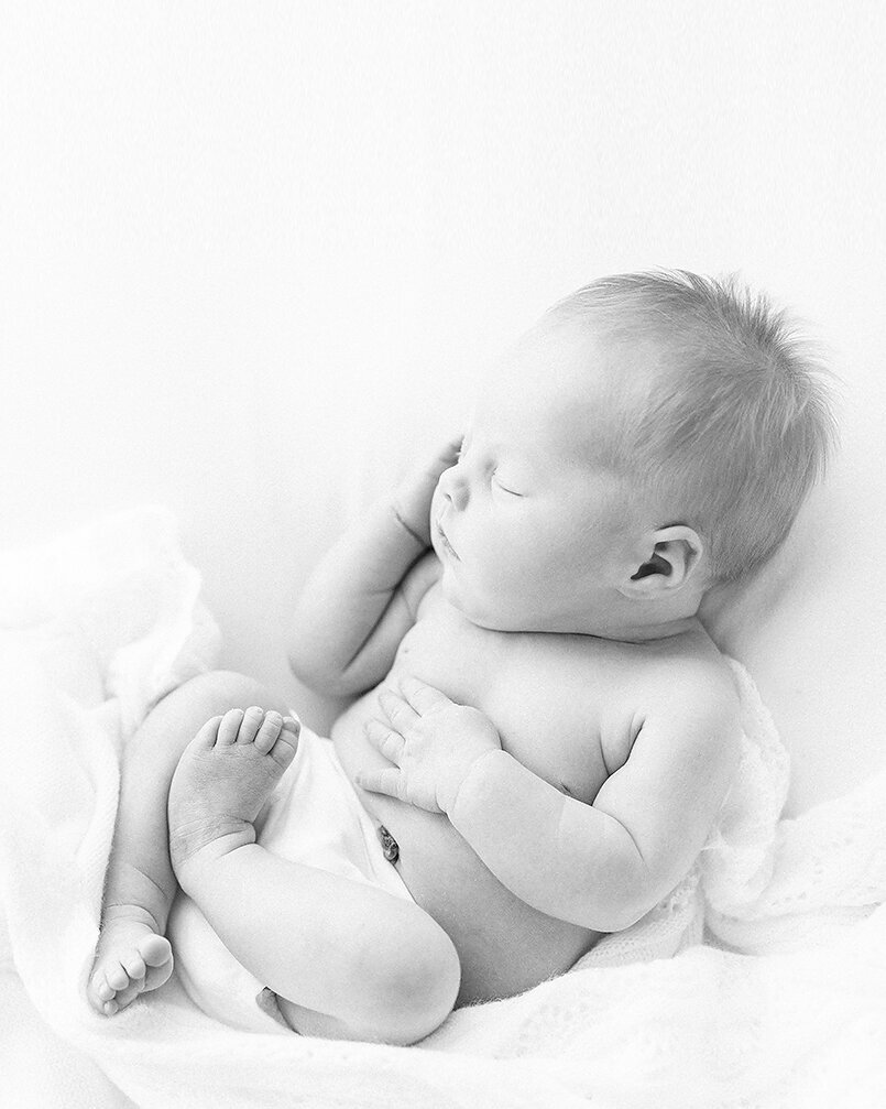 simply photographed newborn boy in black and white
