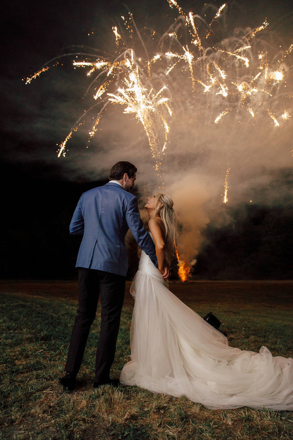 Fireworks exit at outdoor castle wedding in France