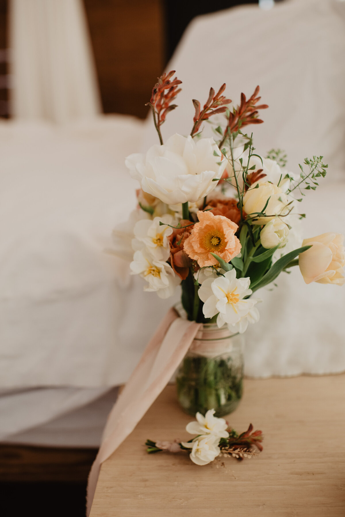 Utah Elopement Photographer captures bridal bouquet with boutonniere