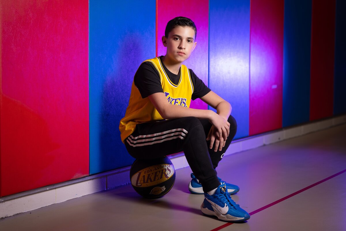 bar-mitzvah-boy-sitting-on-basketball-nj