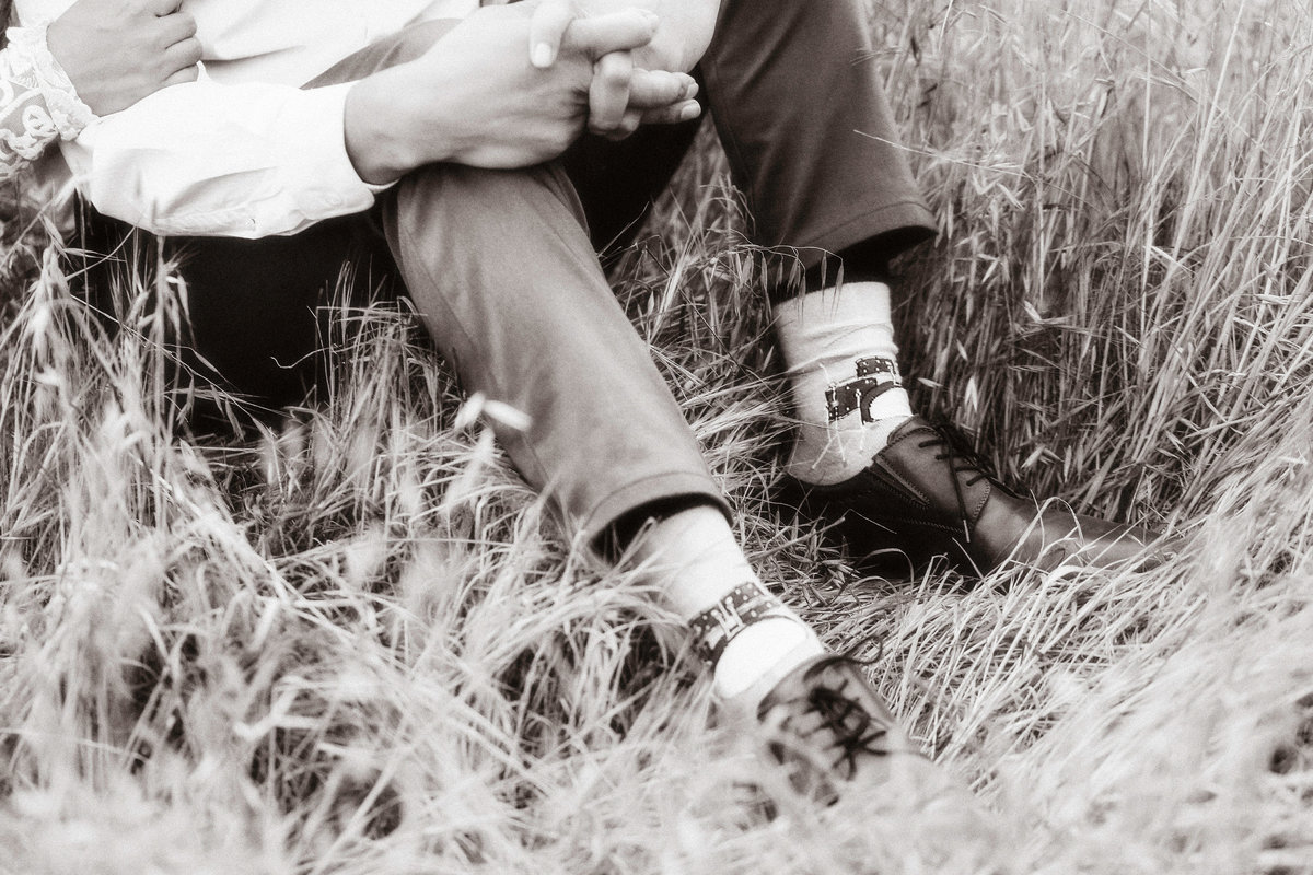 Engagement Photograph Of  man Showing His Shoes And Socks Black And White Los Angeles