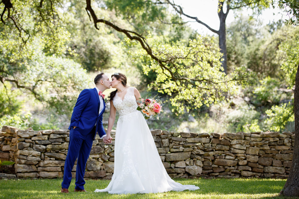 Addison grove wedding photographer bride groom kiss first look 11903 Fitzhugh Rd, Austin, TX 78736