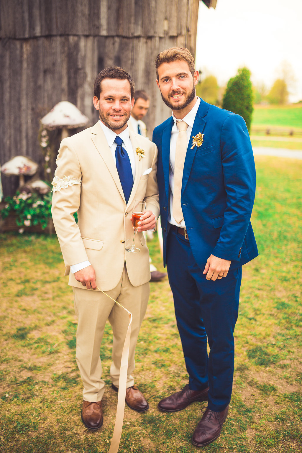 Wedding Photograph Of Groom in Blue Suit and Man in Light Brown Suit Los Angeles