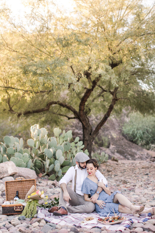 couple having picnic under a tree