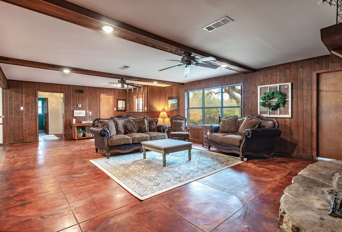 Spacious living room with plenty of seating in this three-bedroom, two-bathroom ranch house for 7 with incredible hiking, wildlife and views.