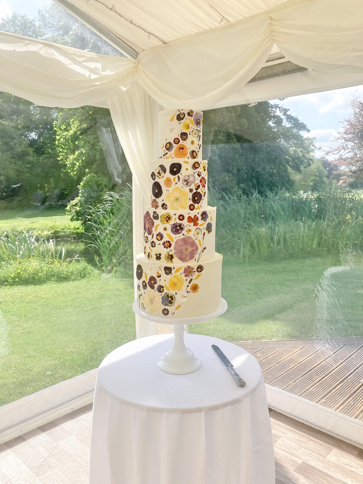 Tall 4 tier edible flower cake at Ardington House