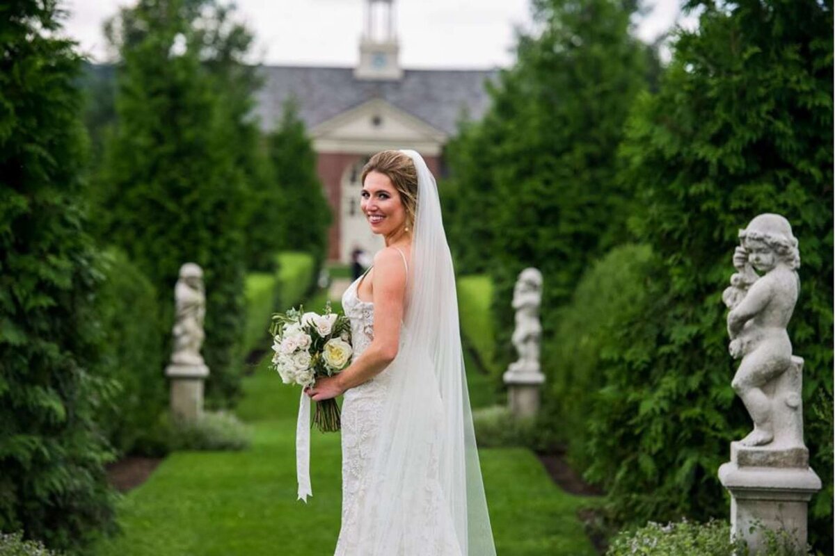 Elegant bridal portrait with blush and white bouquet at a luxury Italian inspired Chicago North Shore wedding.