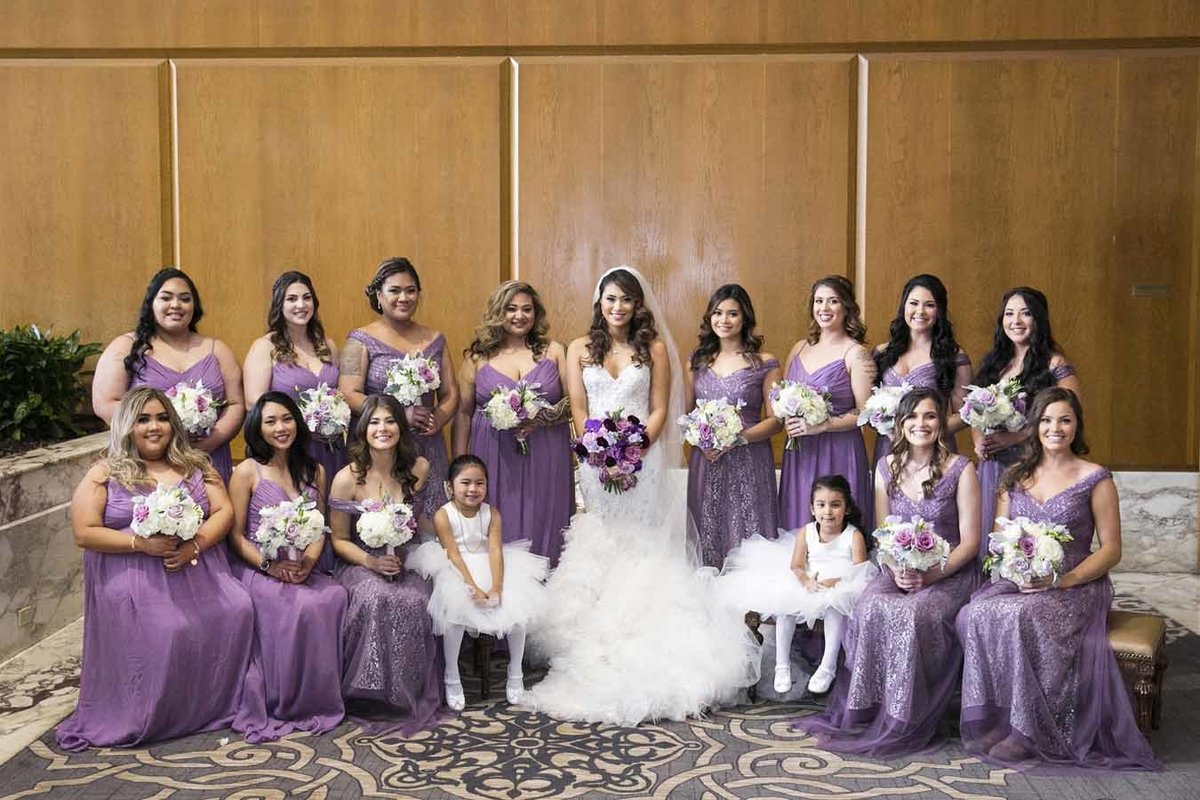 Mara loves the color purple and dressed all her bridesmaids in it at her beautiful Seattle wedding.