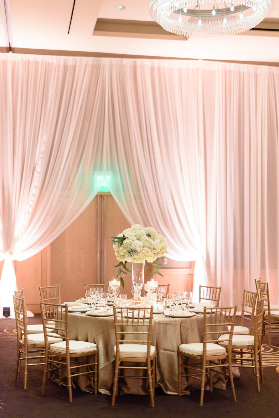White flower and gold Chivari chair blush draping Four Seasons Seattle winter wedding reception