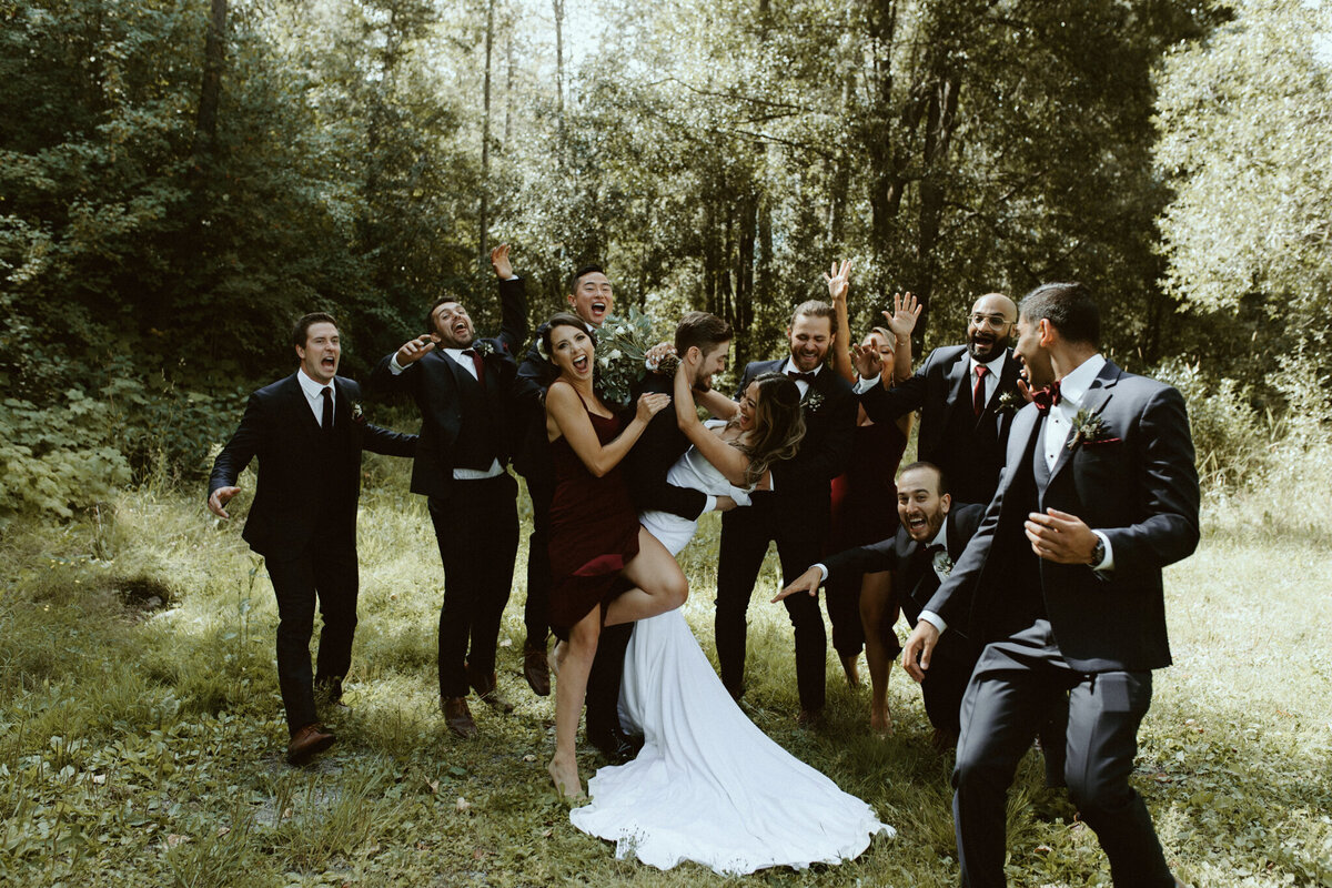 Fun bridal party captured by Tim & Court Photo and Film, joyful and adventurous wedding photographer and videographer in Calgary, Alberta. Featured on the Bronte Bride Vendor Guide.