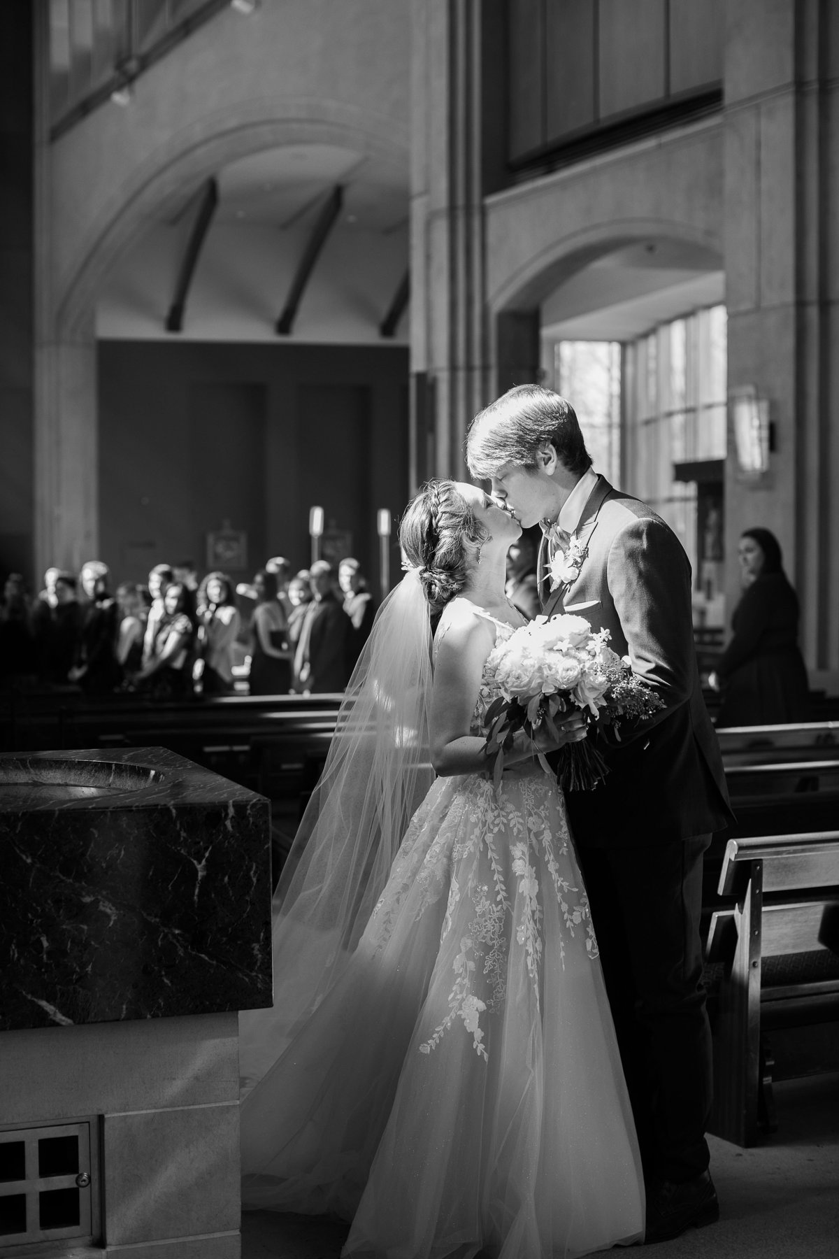 Wedding Photographer, black and white image of couple kissing