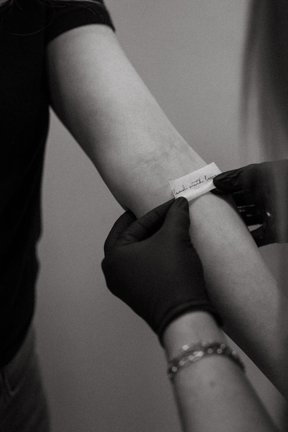 Custom minimalist tattoo featuring subtle detailing, created by a fine-line specialist in Pittsburgh.