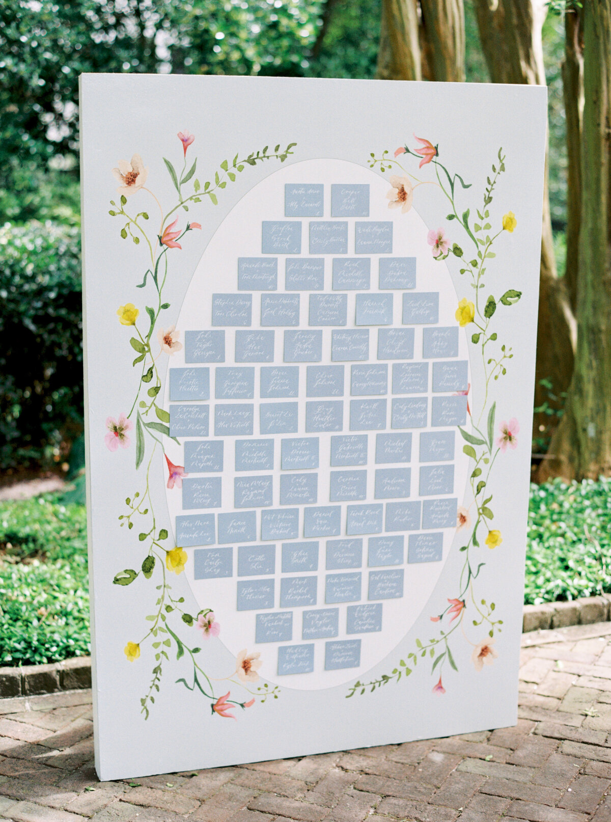 Wildflower themed wedding seating chart. Thomas Bennett House spring wedding details.