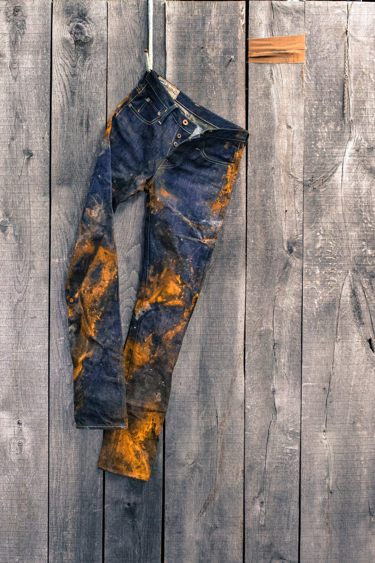 jeans hanging on wall_environmental image