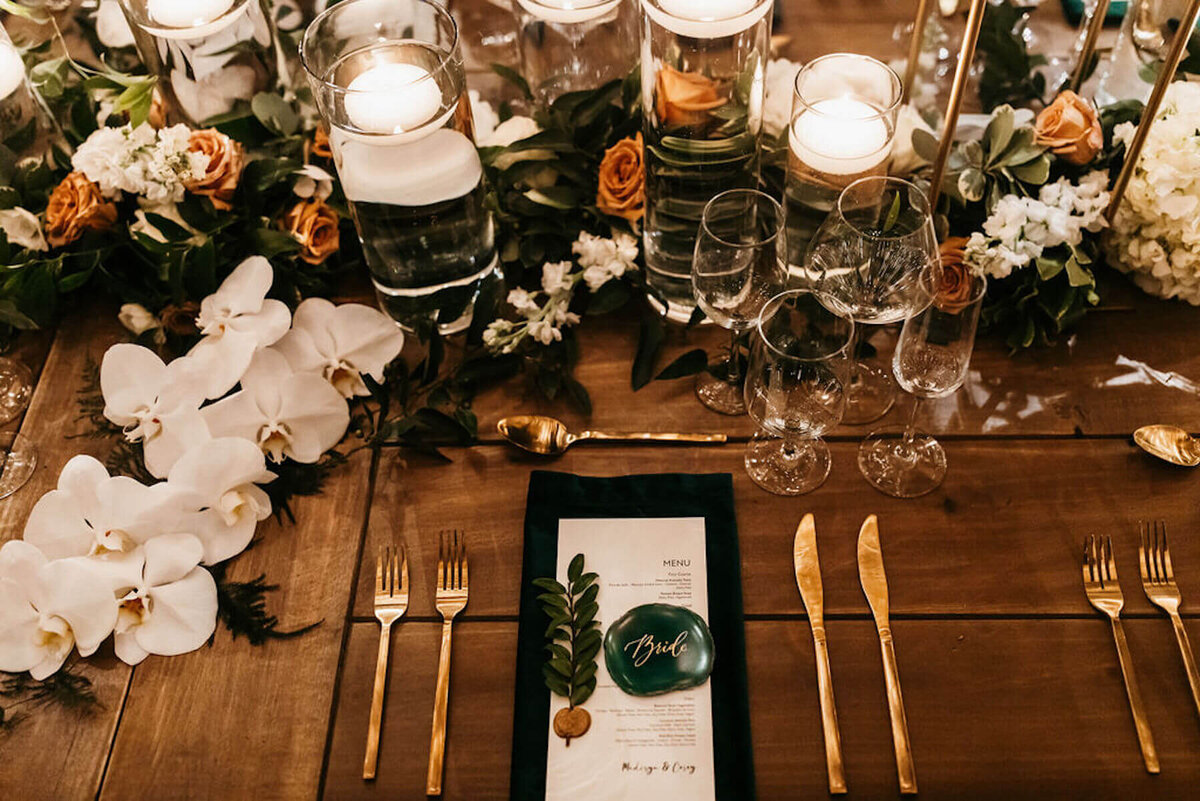 Luxury wedding tablescape with menu cards and wax seals
