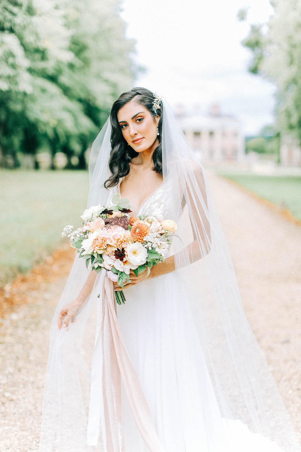 Romantic Bridal Gown with Peach and Ivory Bridal Bouquet