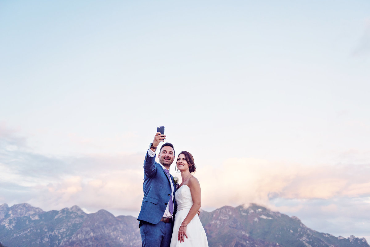 A Bride and Groom on the rooftop overlooking Ravello in Italy on a Destination Wedding