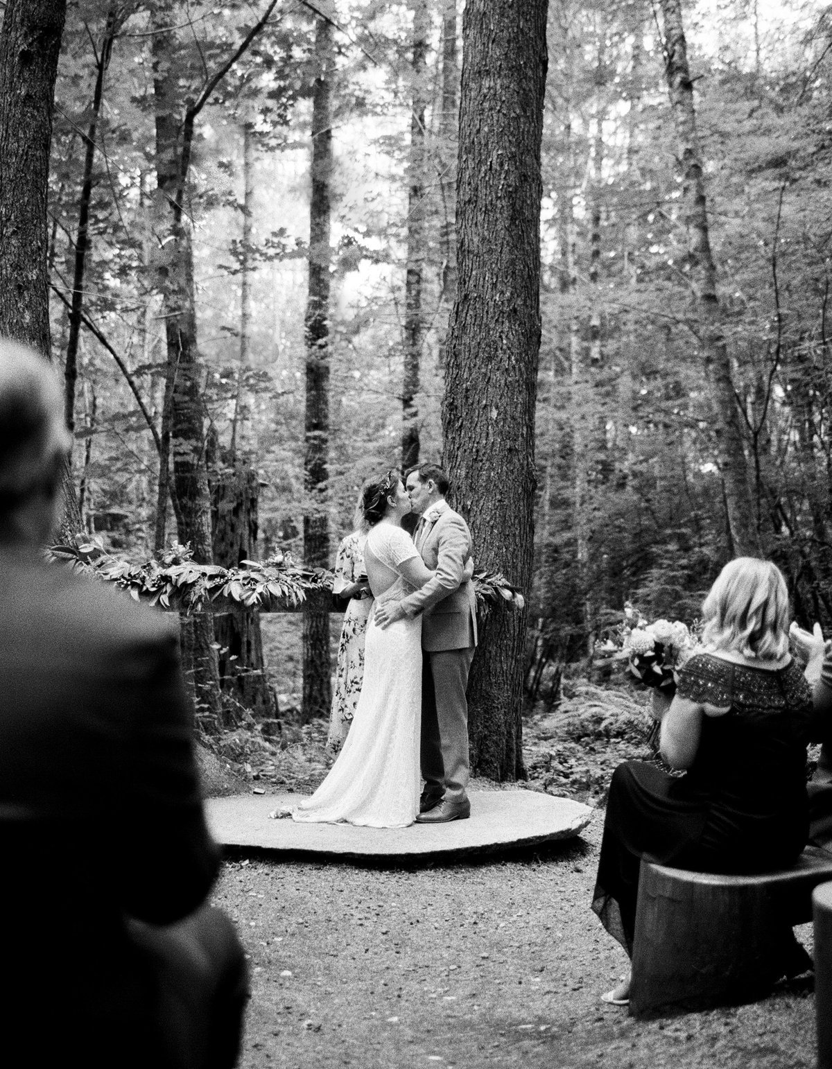 first kiss wooded wedding ceremonyu