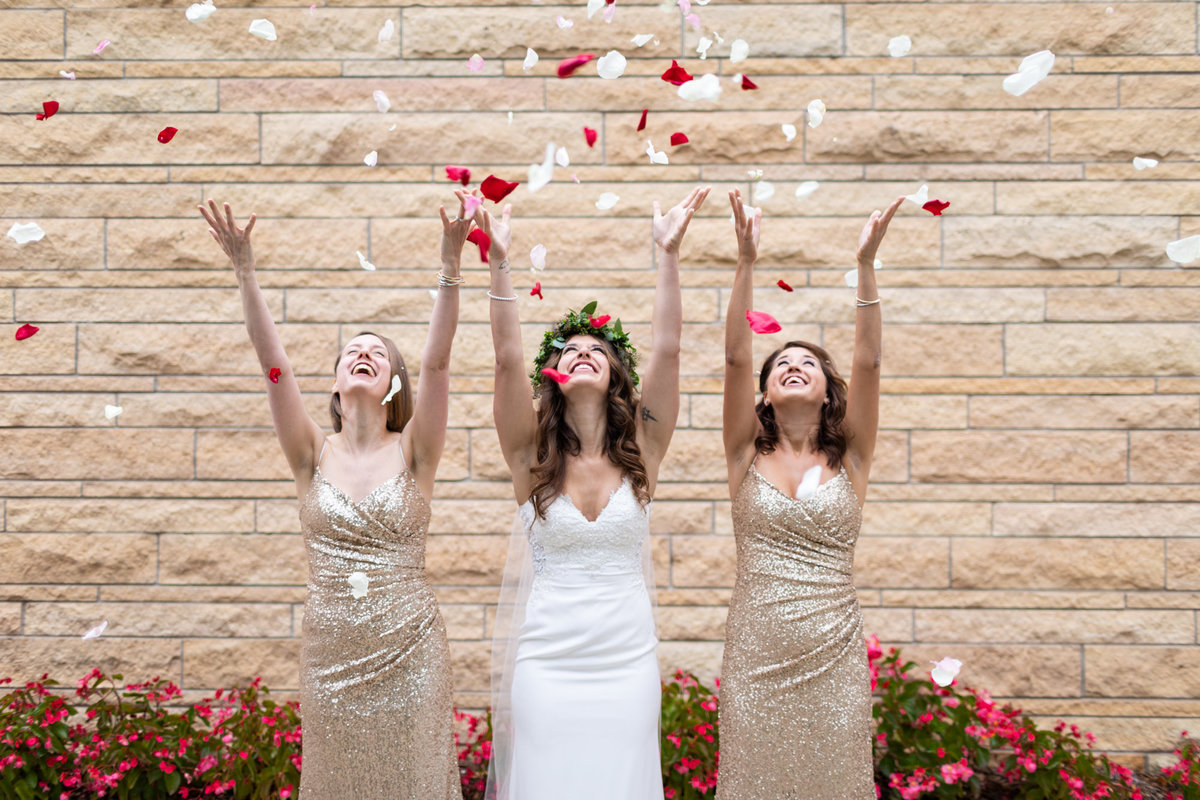 Creative wedding photograph with the Bride and her sister Bridesmaids