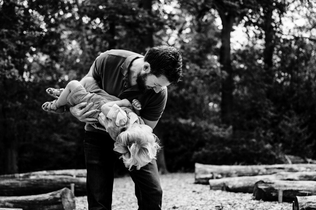 dad playing with his son at bradgate park during family photoshoot with amanda forman photography