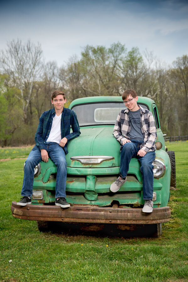 vintage truck with two senior boys