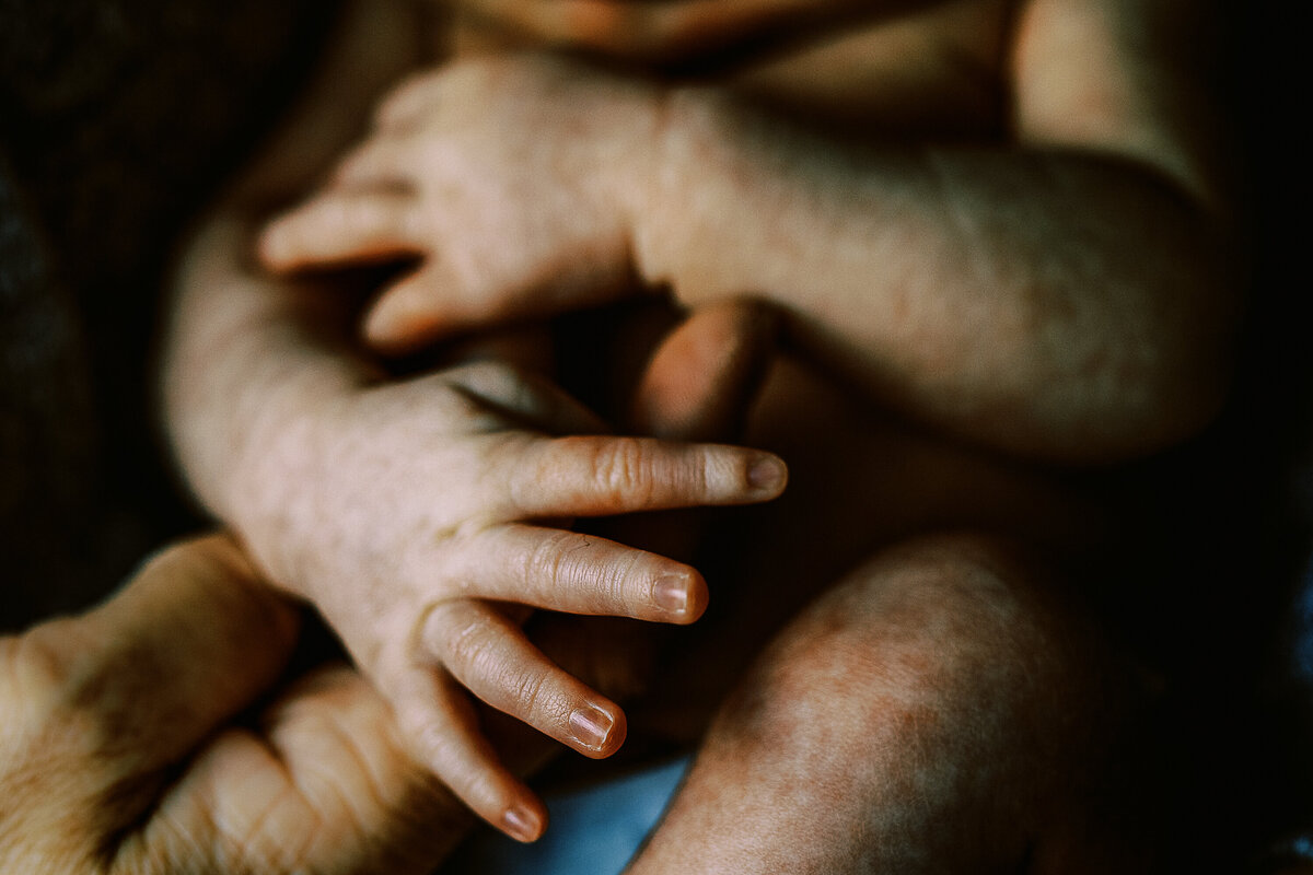 details of a baby's hands during a lifestyle newborn photography session