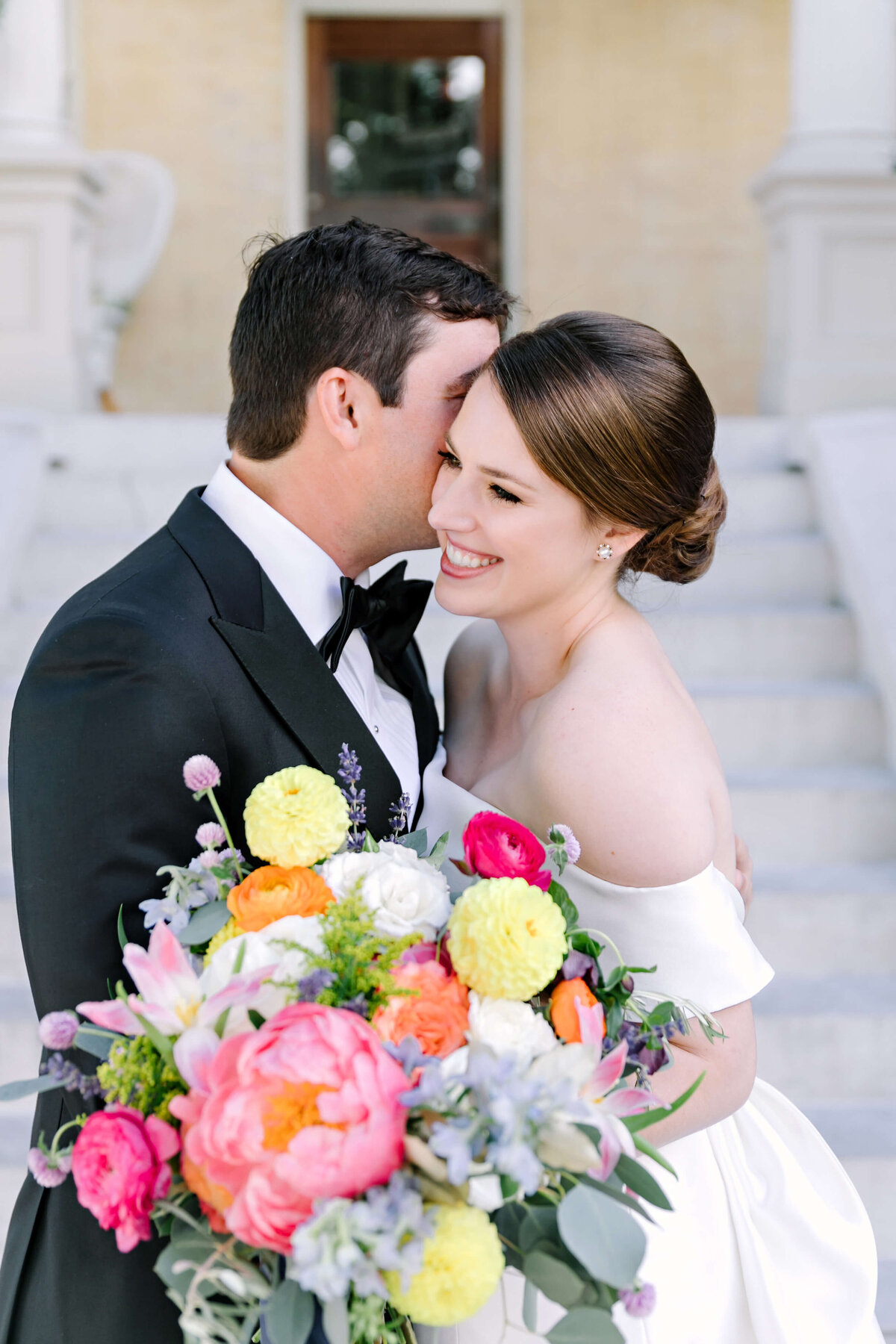 Colorful wedding flowers with hot pink peonies by Stems in Austin