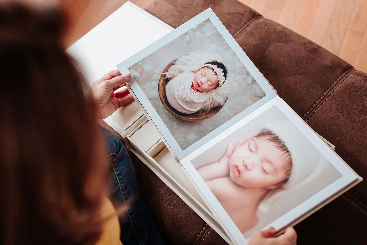 sample of a newborn photo album with pictures of cute babies